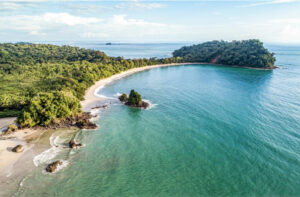 Aerial view of a beach cove in Manuel Antonio
