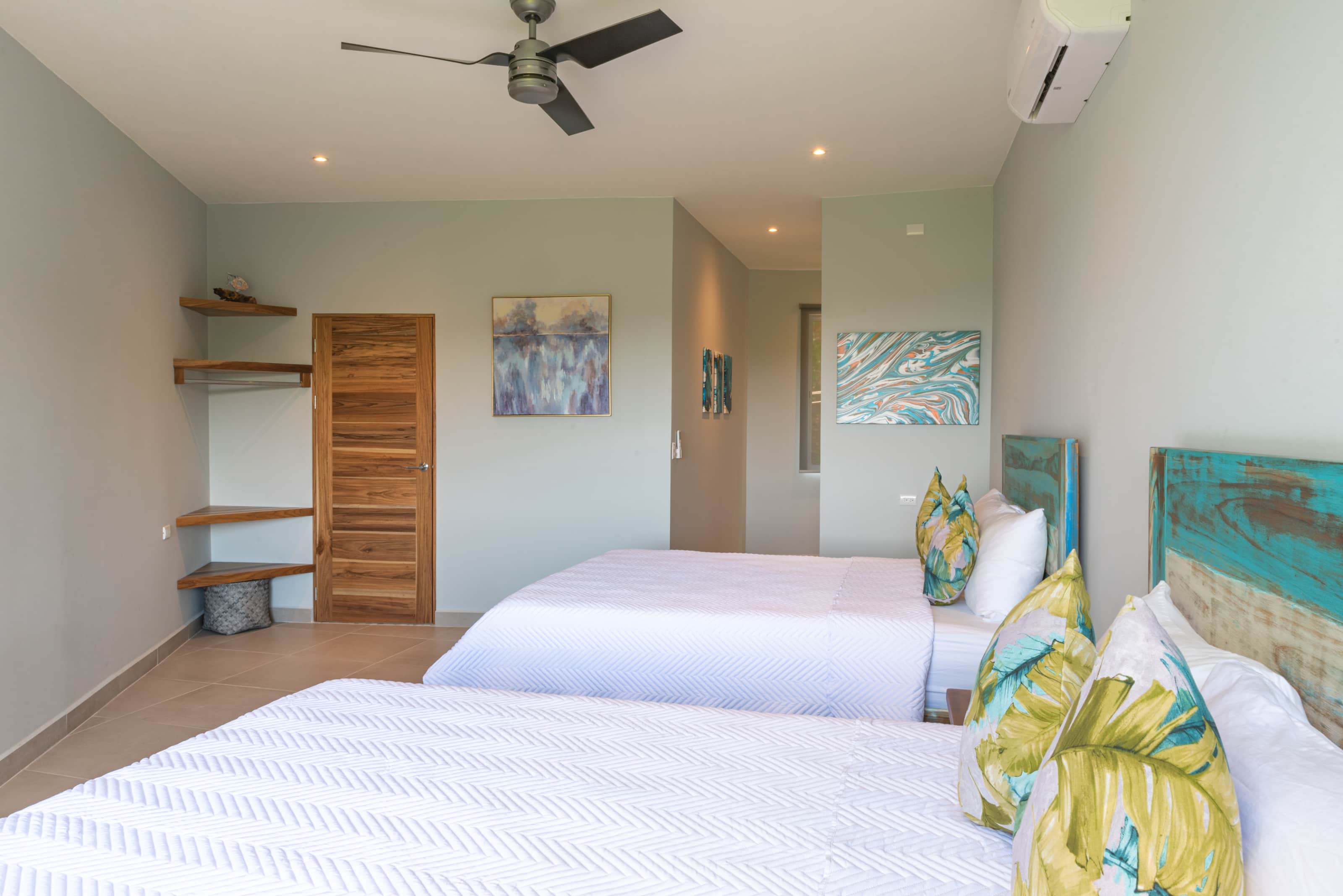 Two queen beds in Tower Suite 3 at Villa Costa Vida