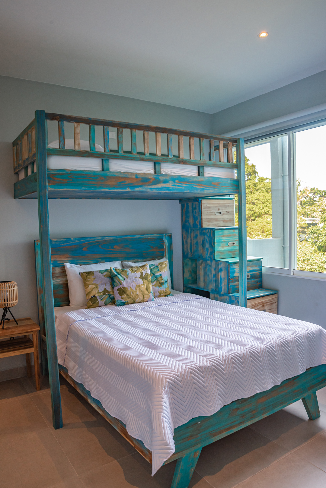 Queen bed and loft bunk bed in Tower Suite 2 at Villa Costa Vida